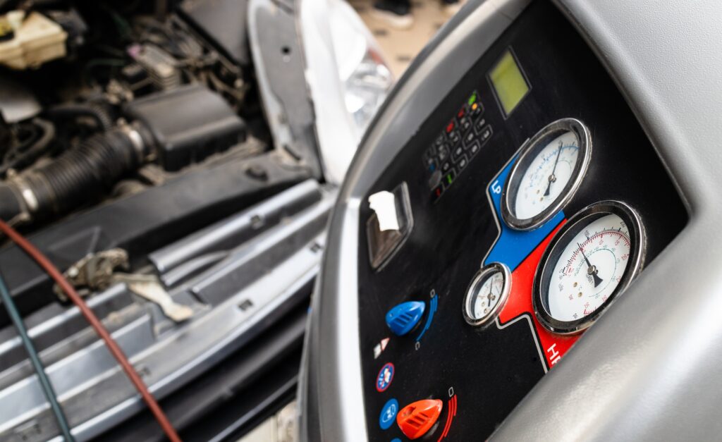 refueling of car air conditioner in garage